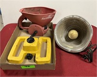 Hand seeder, lawn sprinkler and heat lamp