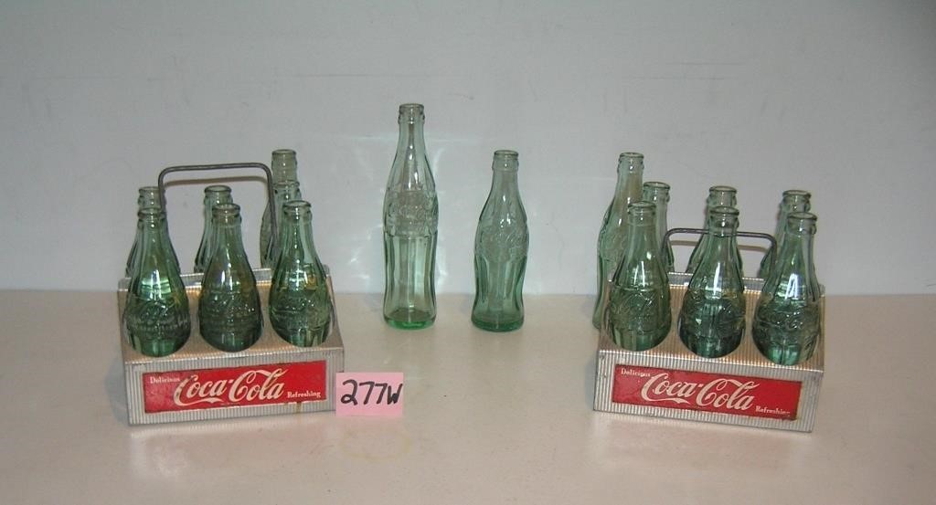 Collection of Coca Cola bottles and 2 early carrie