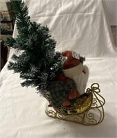 Christmas sleigh. 10”L x 4”w x 10” santa/16" tree