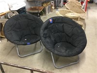 Two round cushioned folding chairs
