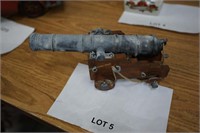 Canon replica-turned metal on wood base