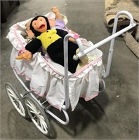 Vintage play baby carriage and dolls