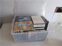 PLASTIC CONTAINER WITH ASSORTED DVDs