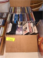 Small box full of cassette tapes & cds