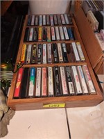 Small wood cassette holder full of cassettes
