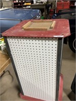 Rotating tool storage cabinet