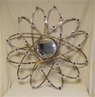 Atomic Beveled Mirror with Floret Accents.