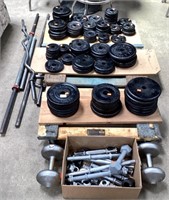 Large Assortment Of Free Weights And Bars