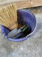 small bucket and hand garden tools