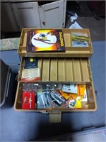 Tan tackle box with fishing supplies