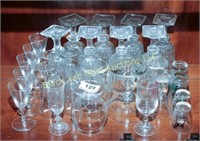 25+ assorted small crystal stems and shot glasses