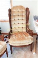 Upholstered wing back arm chair, cane sides