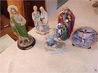4 figurines and a plate