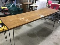 LONG HALL TABLE W WIRE LEGS 6’. Damage on top