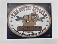 The busted knuckle garage sign