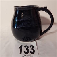 POTTERY PITCHER SIGNED BY ARTIST 7 IN