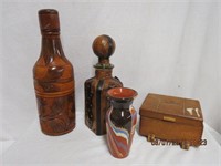 Leather covered decanter, carved wood bottle