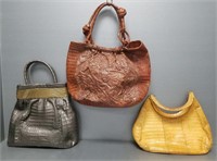 3 Nancy Gonzalez leather handbags