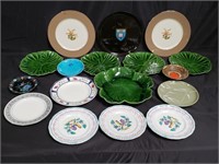 Group of ceramic plates, saucers, center bowl