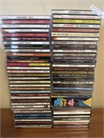 60+ music CD’s, mostly country, easy listening