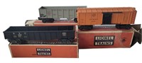 THREE EARLY LIONEL TRAIN CARS IN ORIGINAL BOXES
