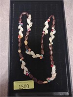 Decorative necklace with shells