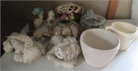 Decorative items including angels, flower pot,