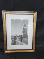 Gold and black framed picture