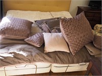 King-size comforter with eight pillows, shams and