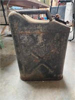 Vintage Jerry gas can. Has liquid in it   metal