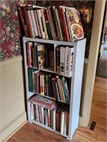 Book shelf and all the cook books.  Look at the