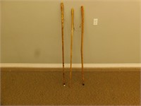3 hand carved walking sticks