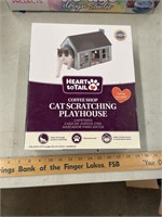 Cat scratching playhouse
