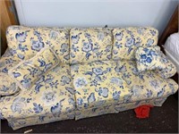 Blue and yellow flowered couch