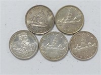 FIVE 1949 - 1960 CANADIAN SILVER DOLLARS