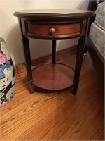 Round side table with drawer and shelf
