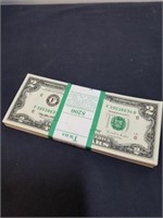 Uncirculated banded $2 bills in numerical