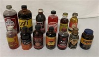 13 mostly full automotive products in glass bottle