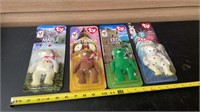 Collect all 4 sealed mini Beanie Babies, some