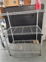 Metal wire shelf.  30" H x 23" W x 13" D.  Look