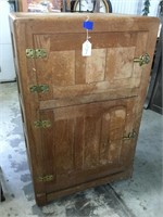 Antique wooden ice box with back window access