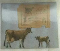 De Laval jersey tin cow, calf pair