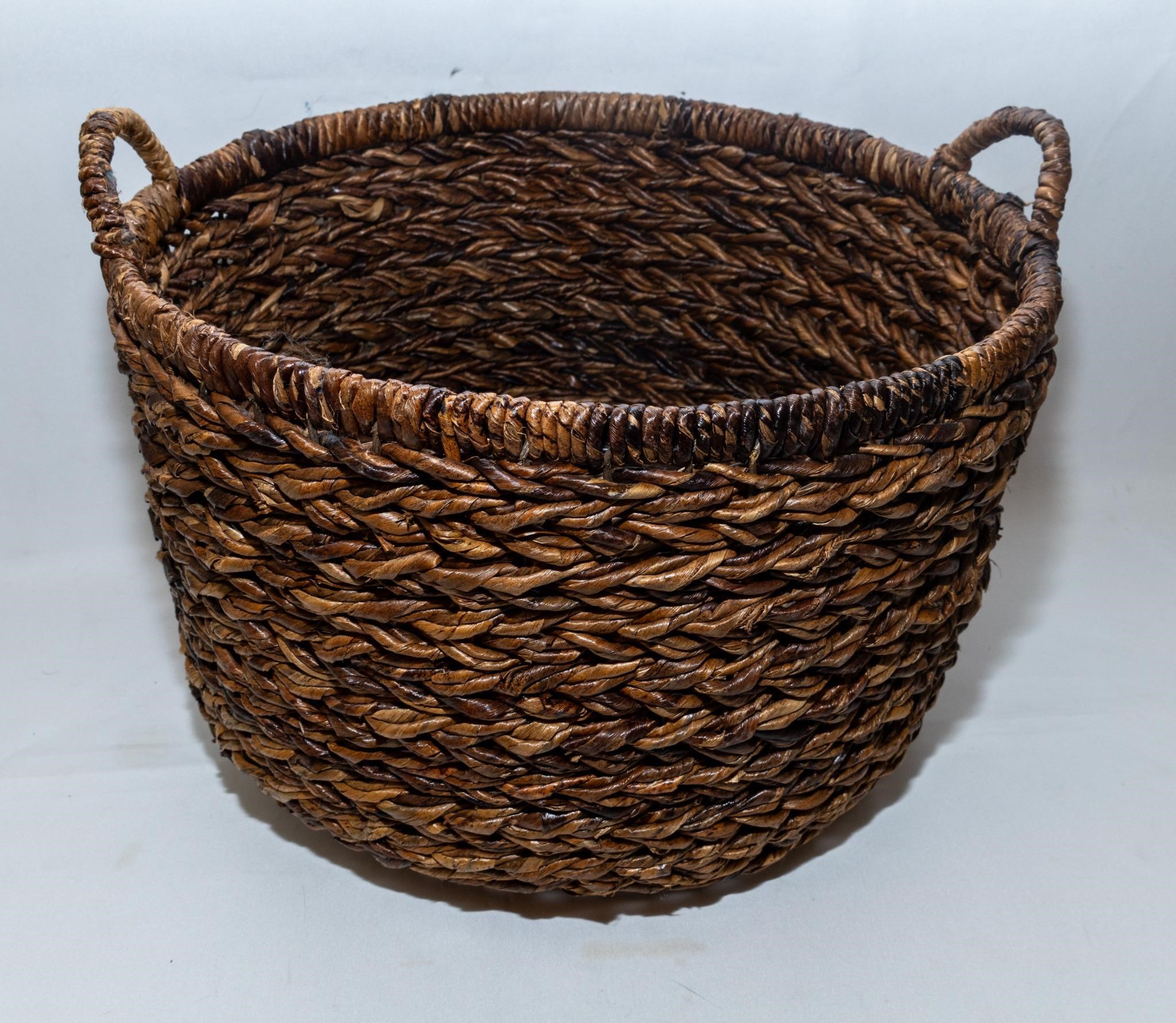 Large wicker storage basket.