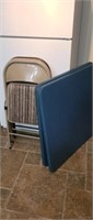 3 assorted padded metal folding chairs and 2 card