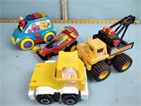Toys including Sesame Street, tow truck