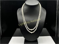 DOUBLE STRAND OF GRADUATING PEARLS WITH 14K CLASP