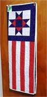 Quilted flag wall hanging with white trim 32x43