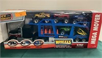 Wheels semi hauler with 4 free-wheeling vehicles