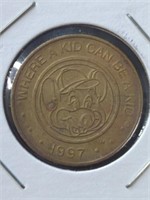 1997 Chuck-E-Cheese token