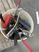 bucket of sockets, vise grips, etc
